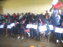 The Graduates proudly showing off their certificates